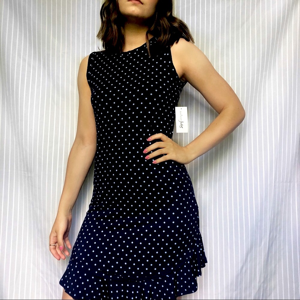 Navy polka dot dress with ruffle detail